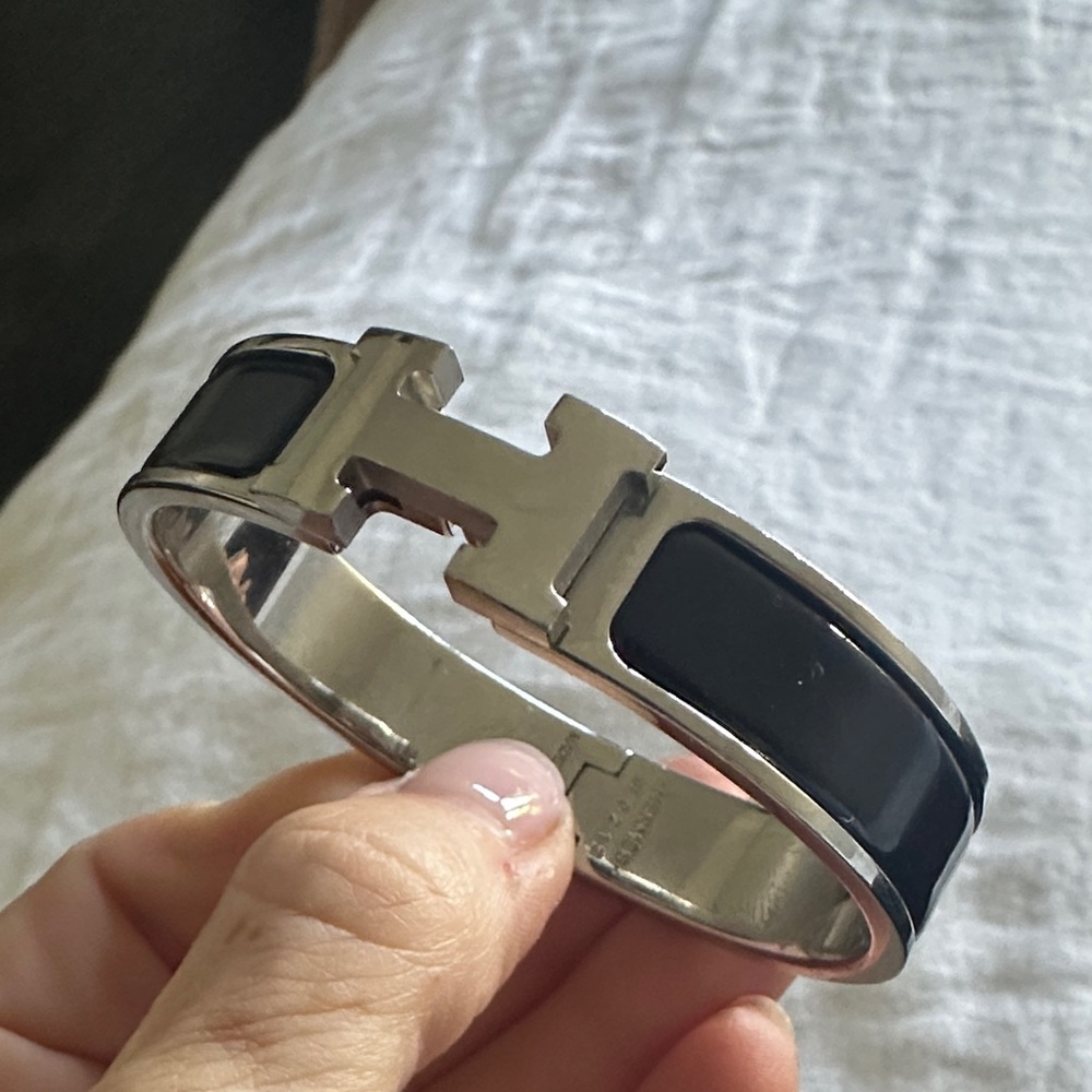 Authentic Hermes black with sterling H.  Bought in Paris .  Didn’t save the box.
